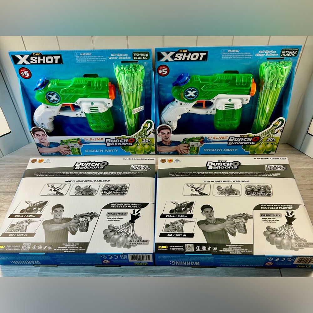 X-Shot Water Blaster30 w/self Sealing Balloons.  Set of 4 guns for gift giving.
